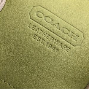 I’m selling a green coach purse.